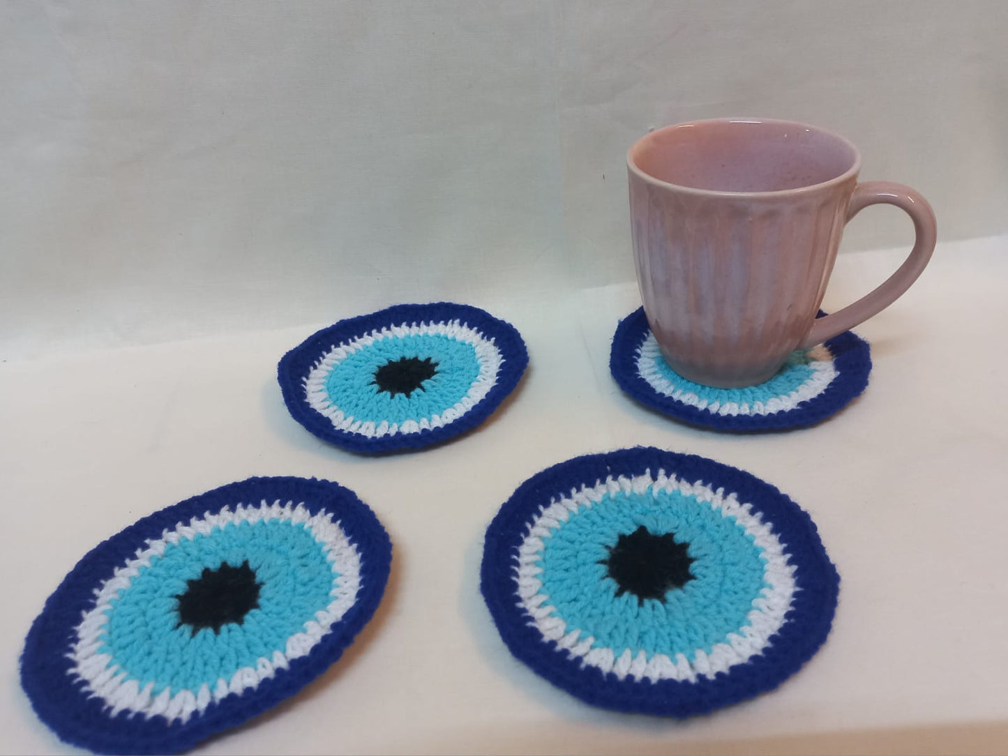 Evil Eye Crochet Coasters: Ward off Negativity in Style - Set of 4