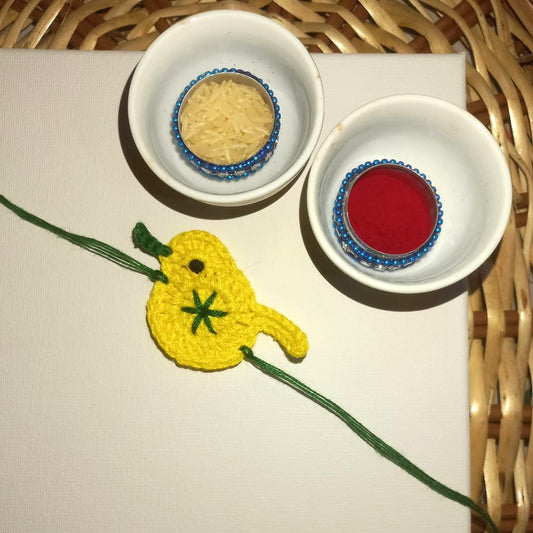 Cheerful Yellow Bird Crochet Rakhi