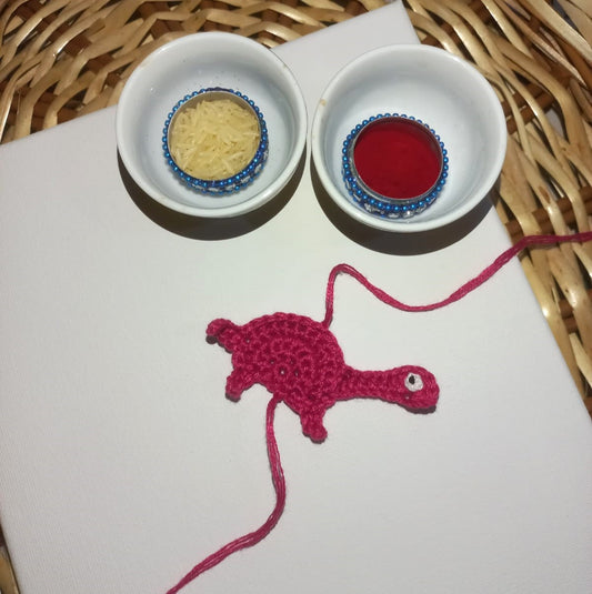 Adorable Red Dinosaur Crochet Rakhi