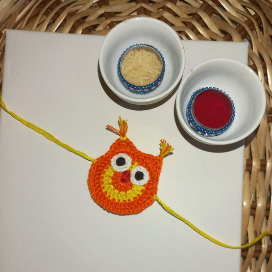 Enchanting Orange Owl Crochet Rakhi